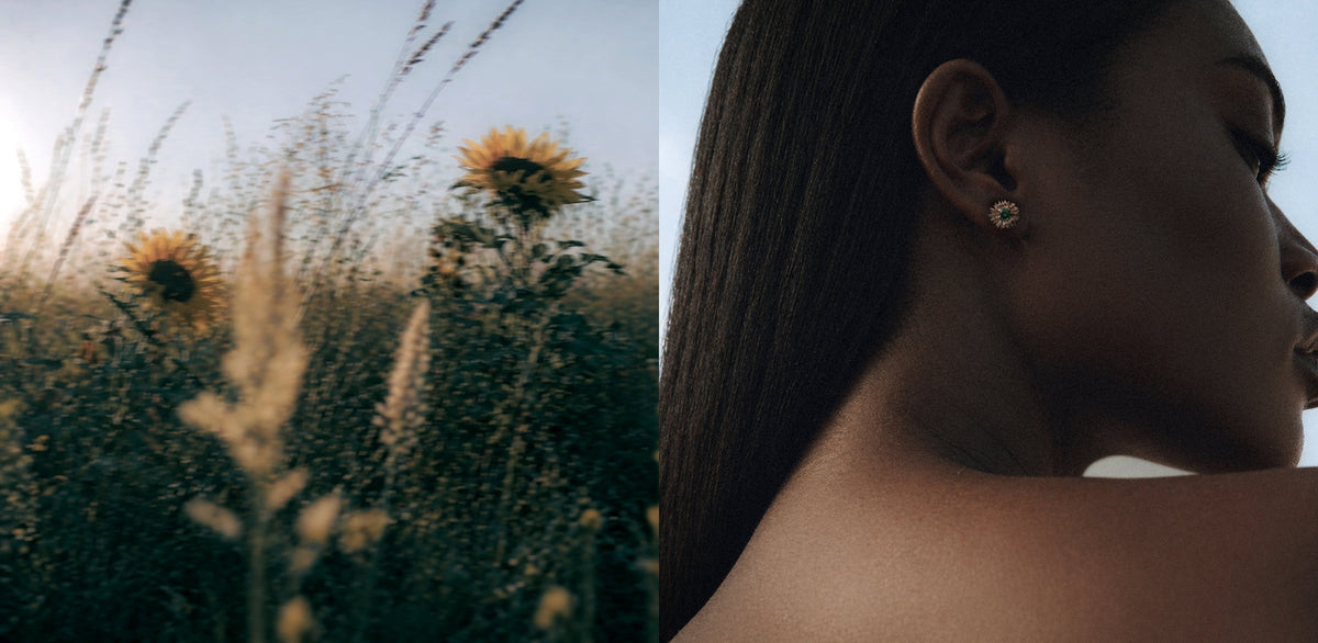 Woman wearing earrings with sunflower field in the background