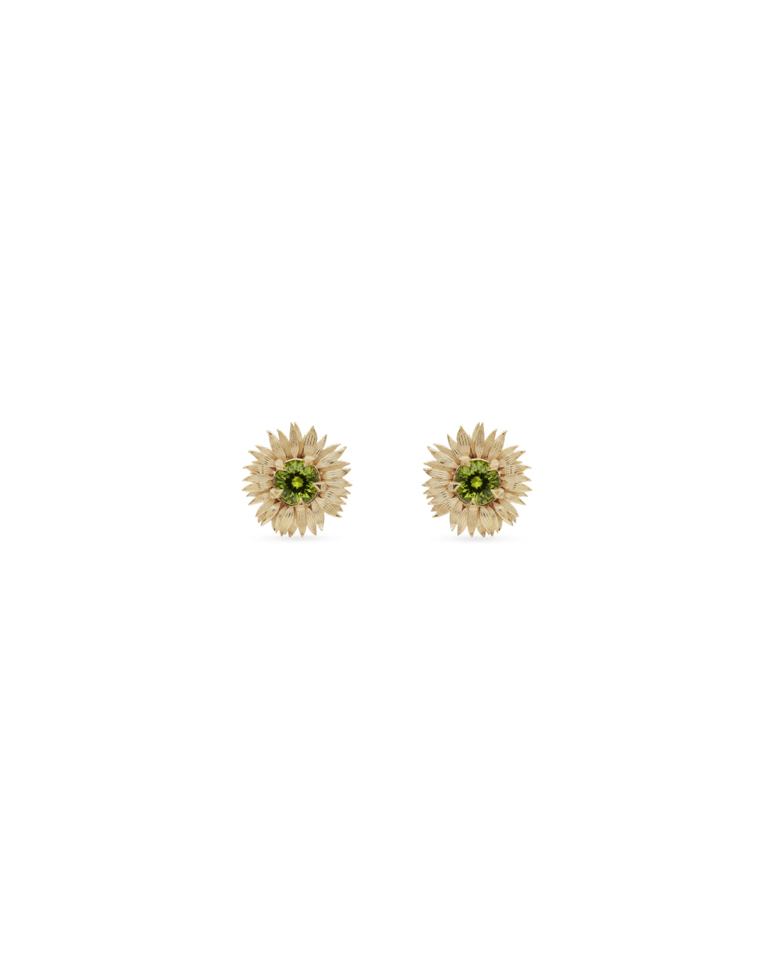 sunflower-shaped earrings with green gemstones on a white background
