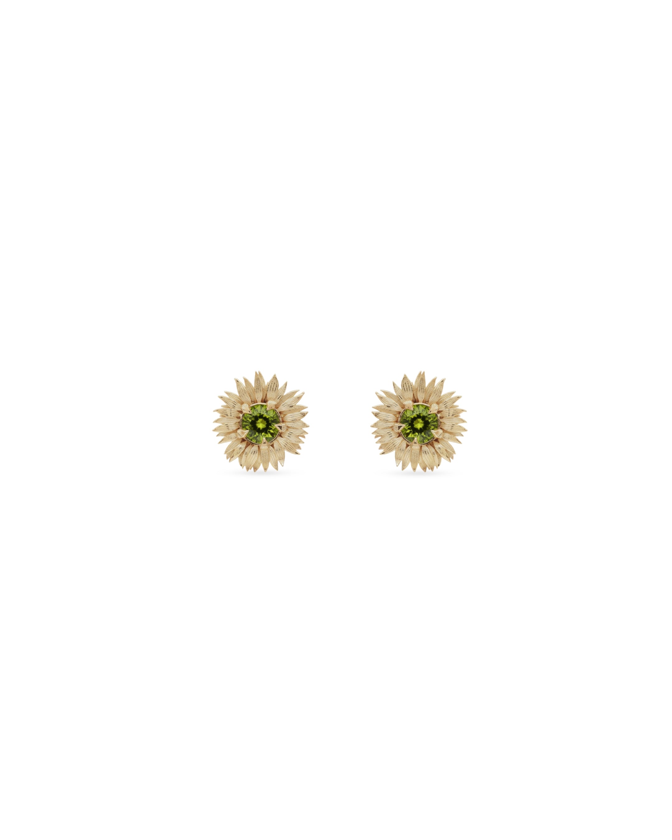 sunflower-shaped earrings with green gemstones on a white background