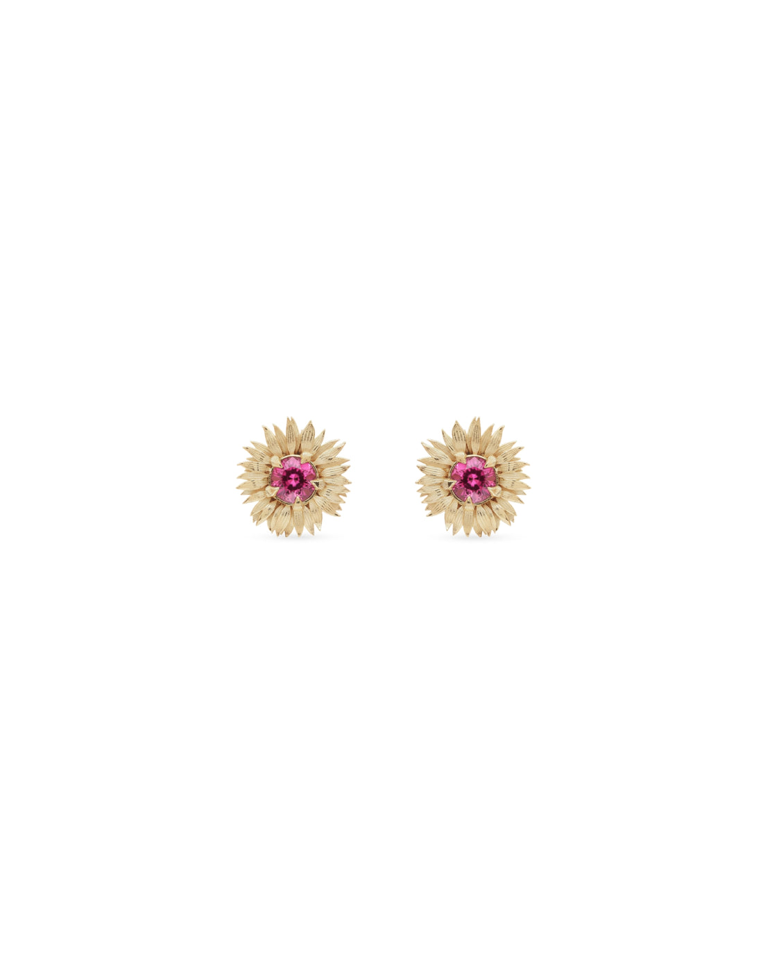 Pair of gold earrings with pink gemstones on a white background