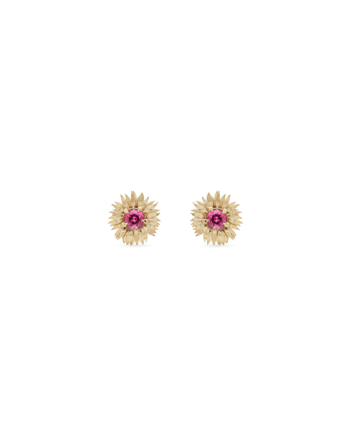Pair of gold earrings with pink gemstones on a white background