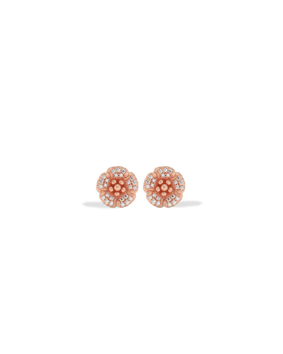 Rose gold earrings with clear stones on a white background
