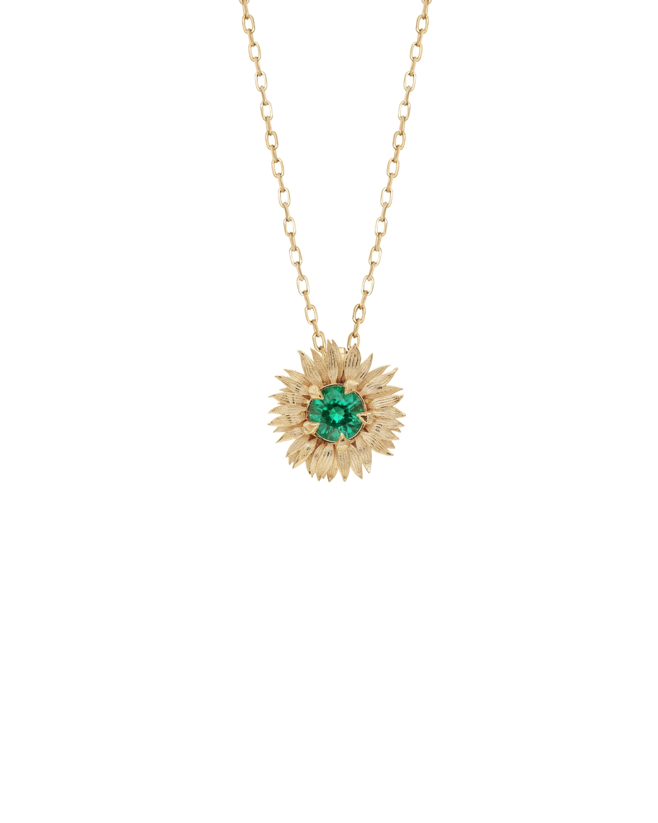 Gold Sunflower necklace with a sunflower-shaped pendant featuring a green gemstone on a white background