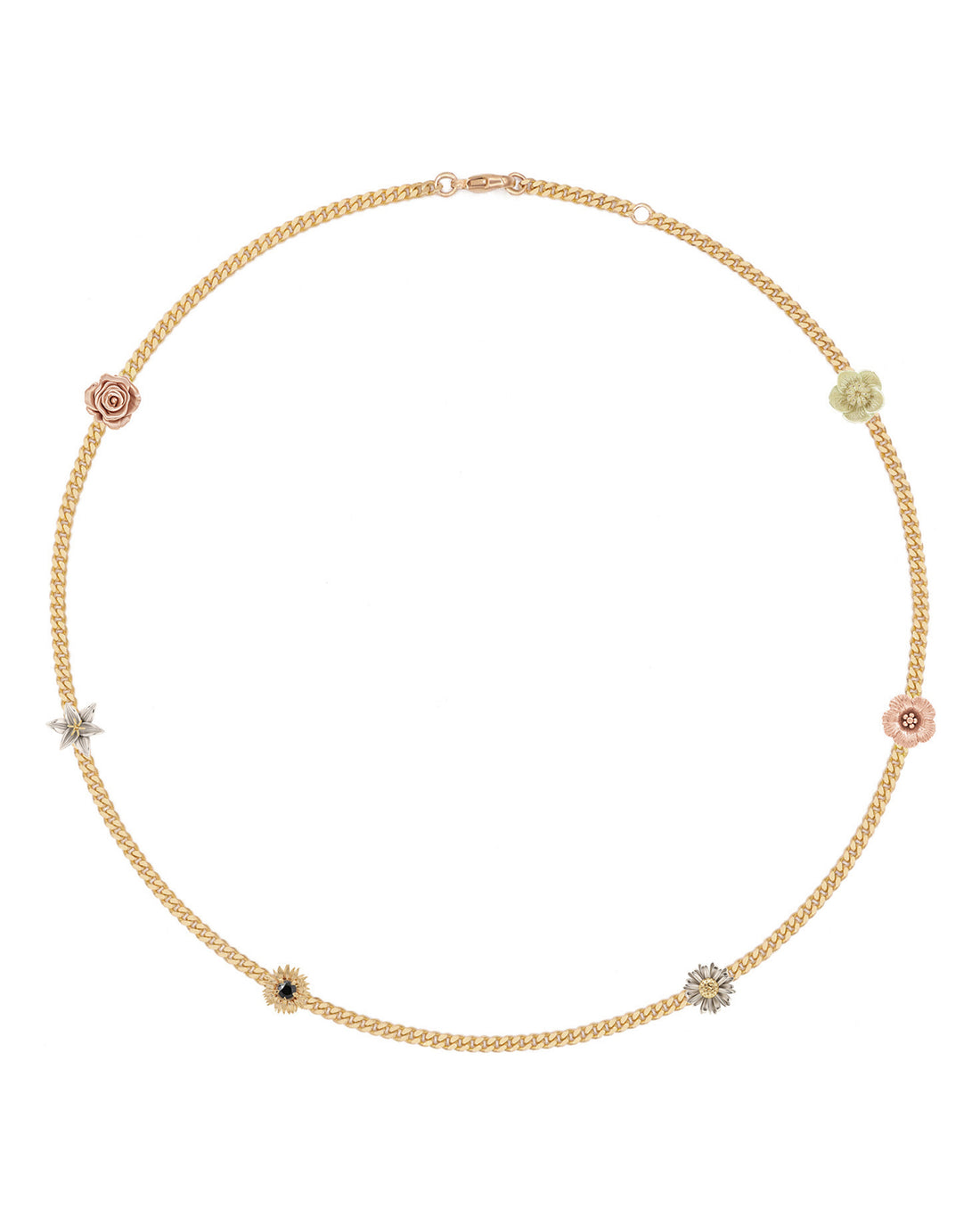A slim curb chain choker necklace with floral accents, featuring yellow gold links and small multicolored stone embellishments.