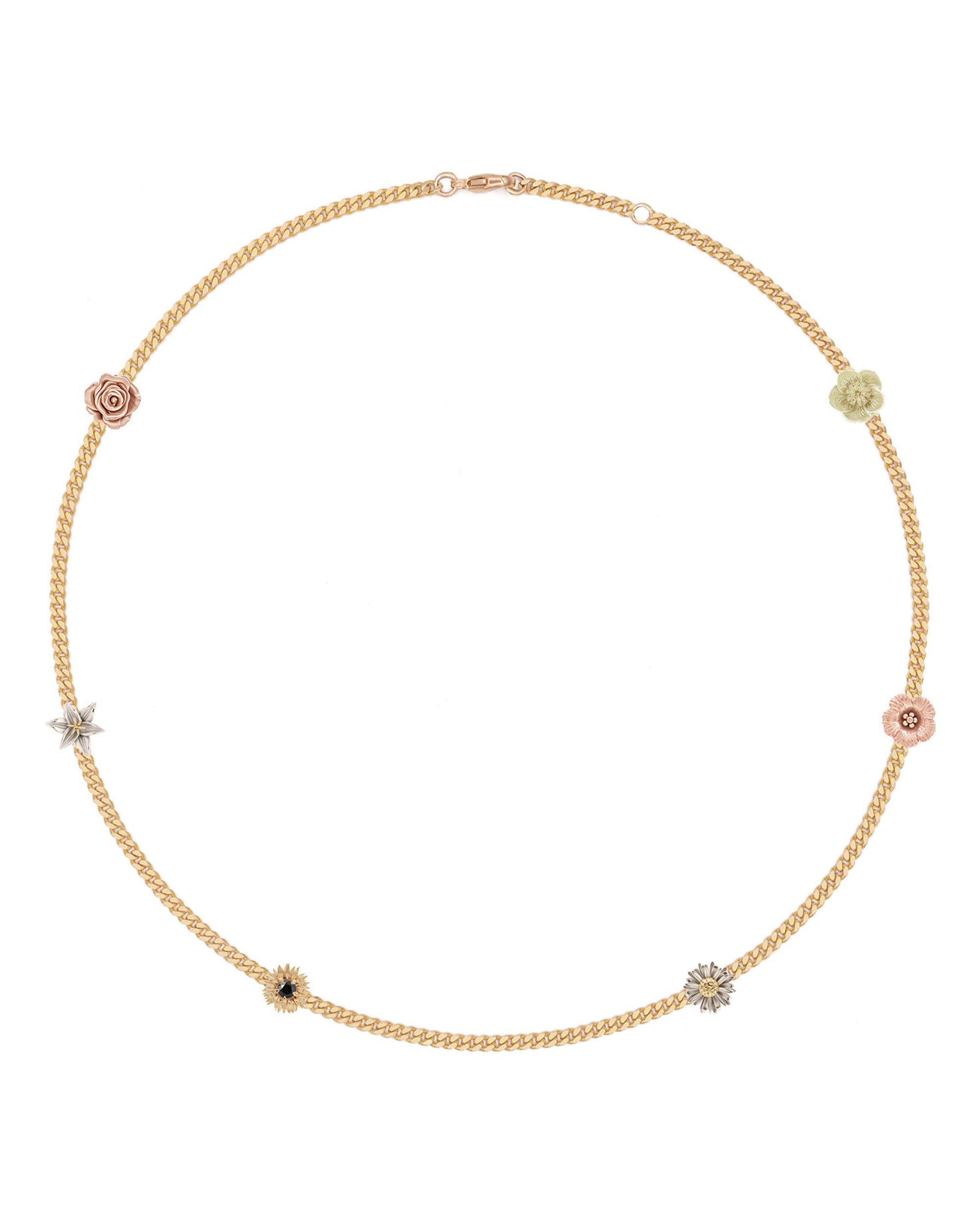 A slim curb chain choker necklace with floral accents, featuring yellow gold links and small multicolored stone embellishments.