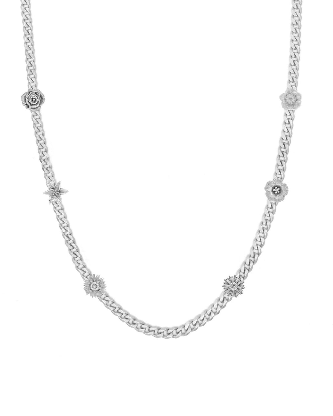 Silver chain necklace with small round flower appliques on a white background