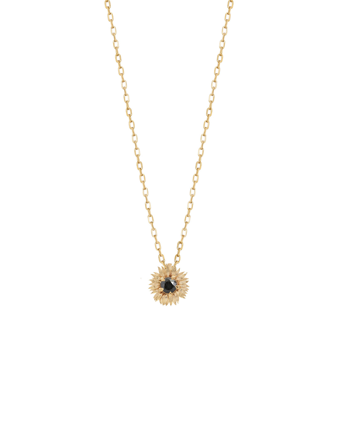 A 14k yellow gold sunflower charm necklace with a white diamond at the center, displayed on a plain background.