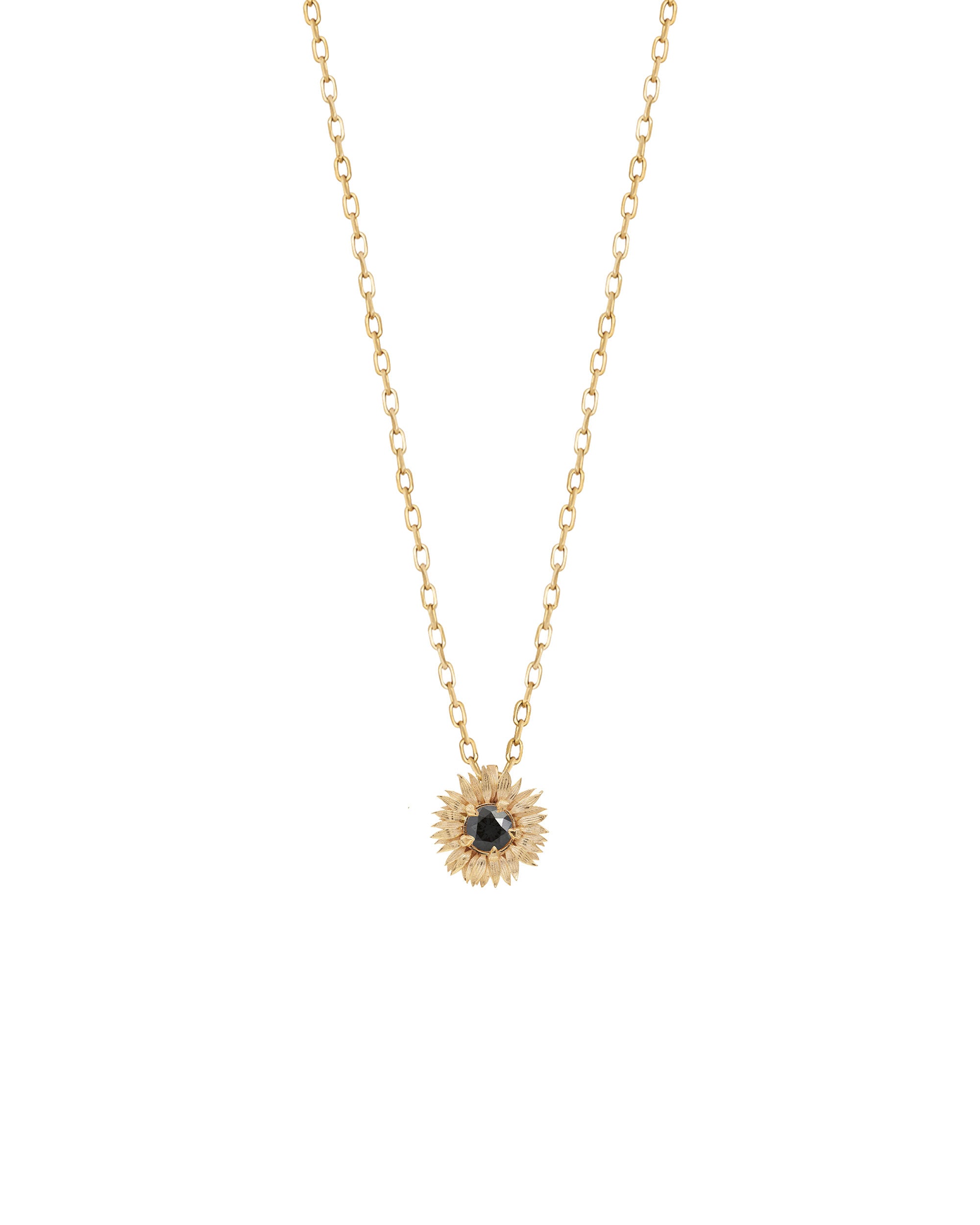 A 14k yellow gold sunflower charm necklace with a white diamond at the center, displayed on a plain background.