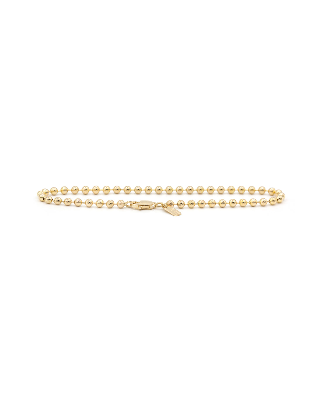 A 14K gold nano beaded bracelet with a lobster clasp, displayed against a white background.