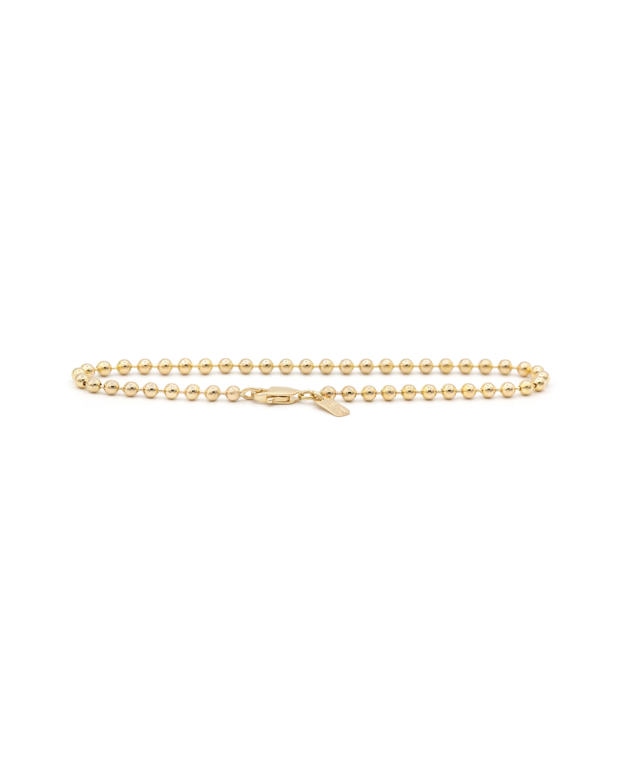 A 14K gold nano beaded bracelet with a lobster clasp, displayed against a white background.