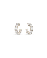 Small white gold diamond hoops with emerald cut white diamonds on a white background