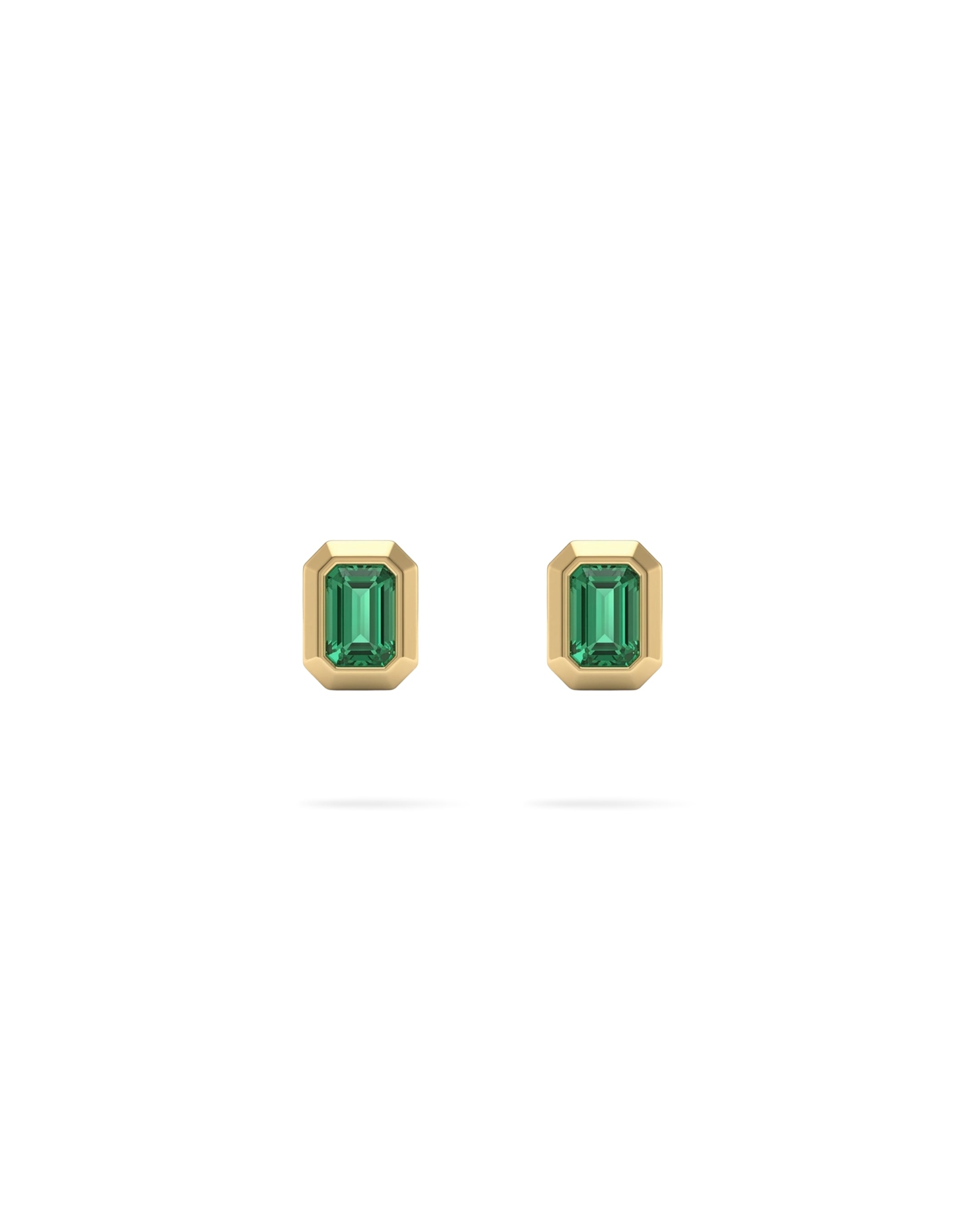 Pair of gold bezel rectangular  earrings with a green gemstone center on a white background
