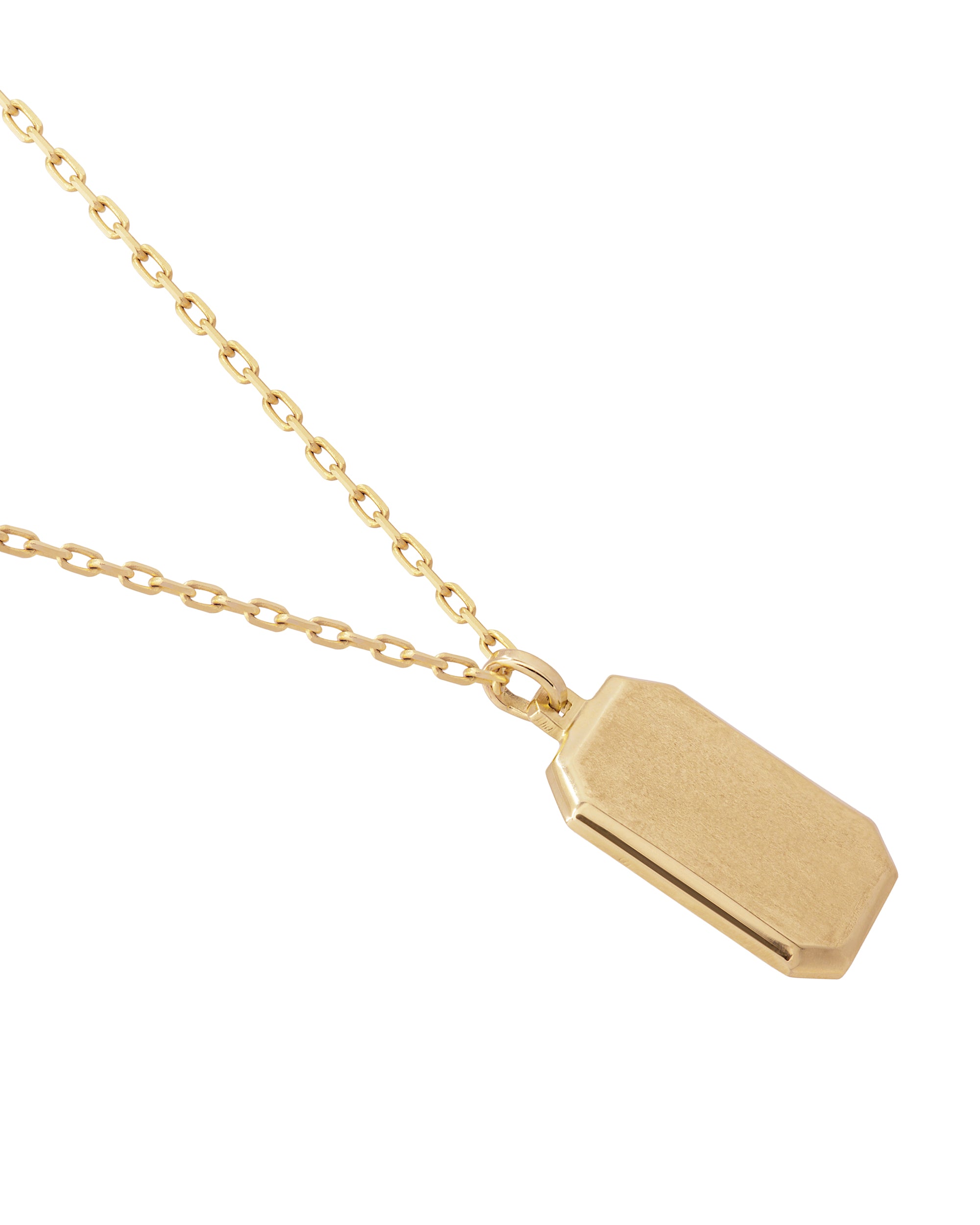 Gold necklace with a hexagonal pendant on a white background