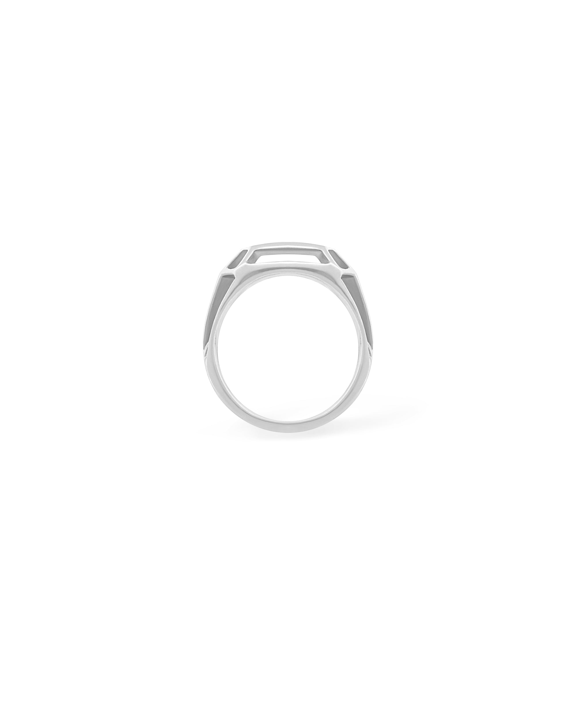 Silver ring with a geometric design on a white background