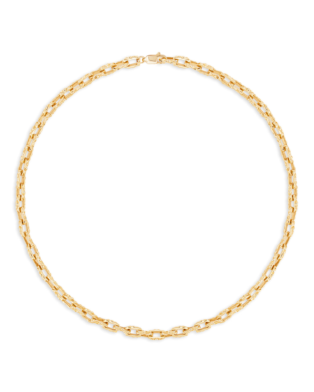 A gold necklace with a reflective surface laid out in a circle on a white background.